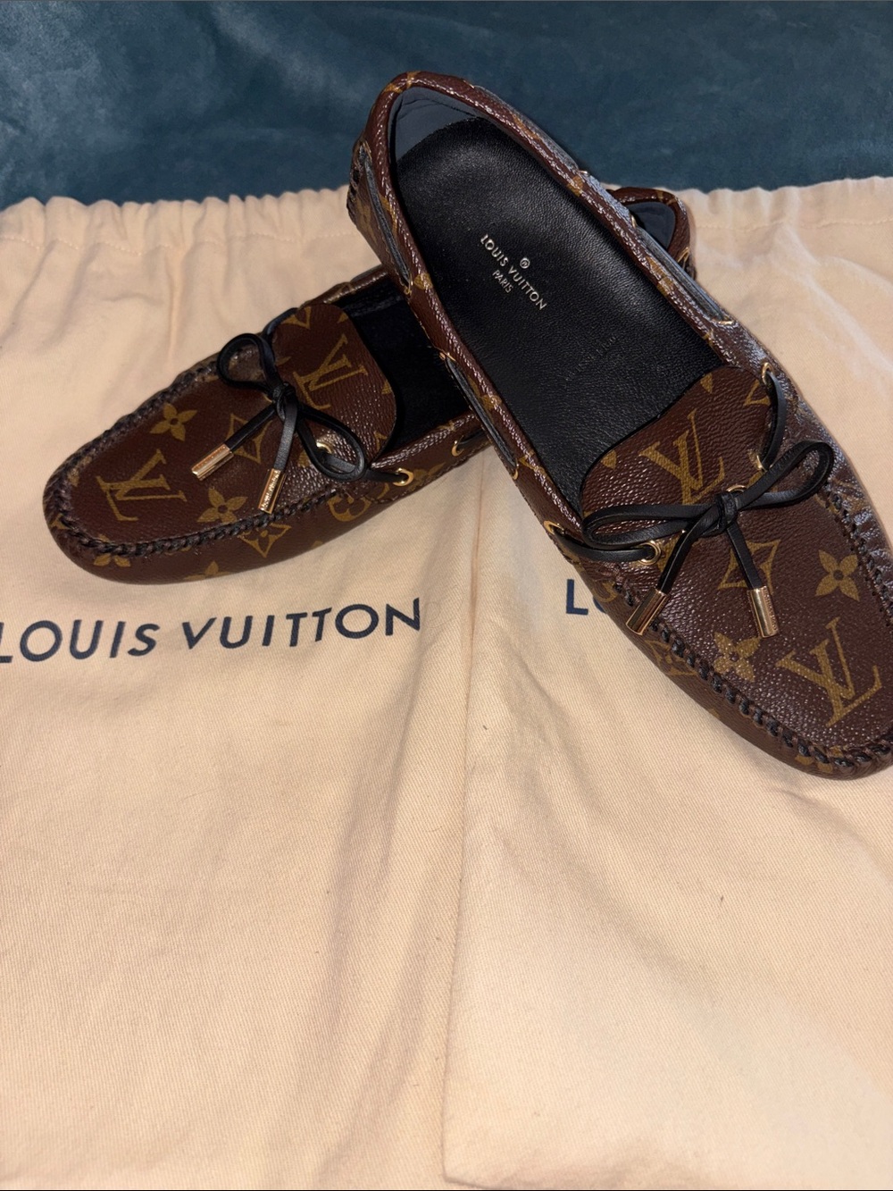Louis Vuitton Brown Monogram Gloria loafers. Never worn with dust bags